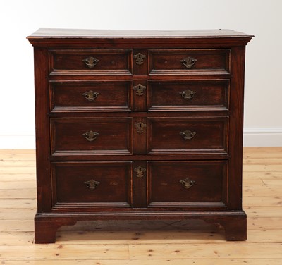 Lot 414 - An oak chest of drawers