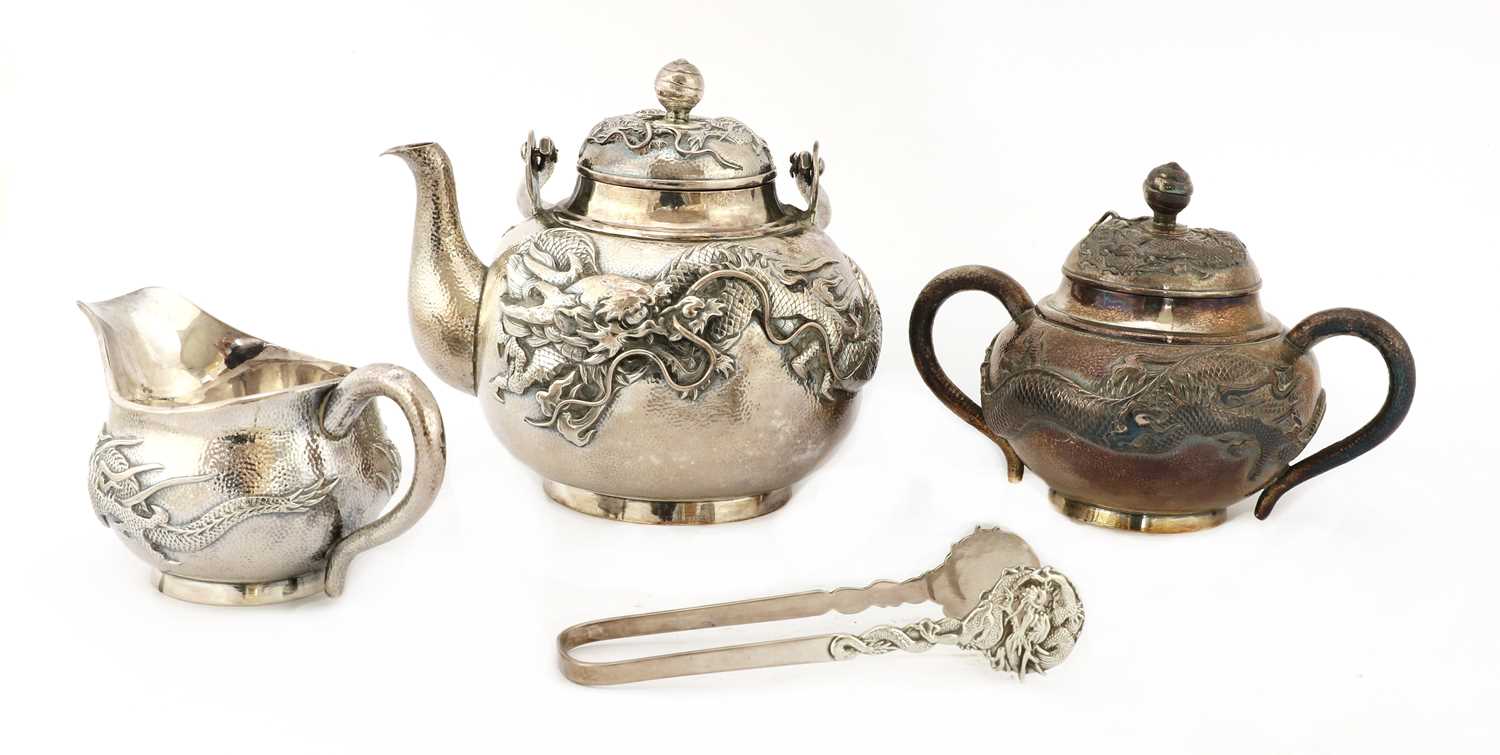 Lot 252 - A Japanese silver three-piece tea service