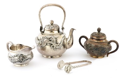 Lot 252 - A Japanese silver three-piece tea service