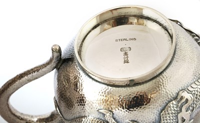 Lot 252 - A Japanese silver three-piece tea service