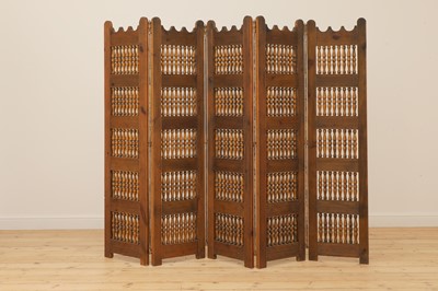 Lot 478 - A Spanish fruitwood folding screen