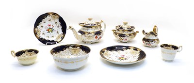 Lot 179 - A 19th century Rockingham style porcelain tea set