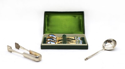 Lot 59 - A Russian silver and niello decorated spoon with twist handle