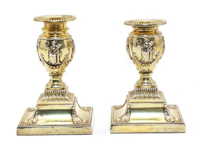 Lot 52 - A pair of silver-gilt dwarf candlesticks