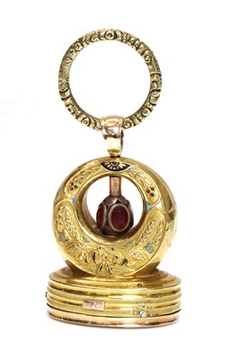 Lot 47 - A Regency gold and enamel musical seal/fob