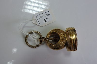 Lot 47 - A Regency gold and enamel musical seal/fob