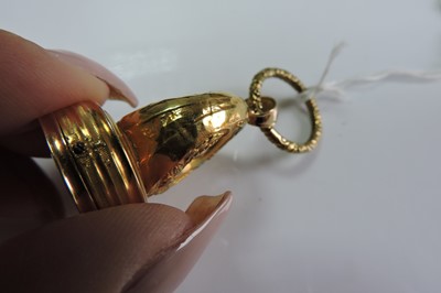 Lot 47 - A Regency gold and enamel musical seal/fob