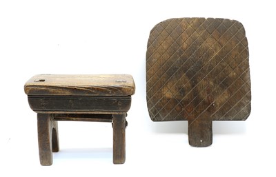 Lot 237 - A small elm? stool or block