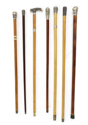 Lot 300 - A collection of Chinese silver and white-metal mounted walking sticks
