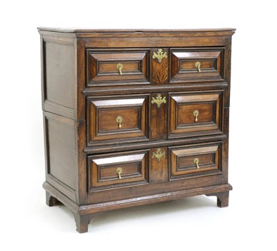 Lot 495 - A late 17th century and later oak three drawer chest