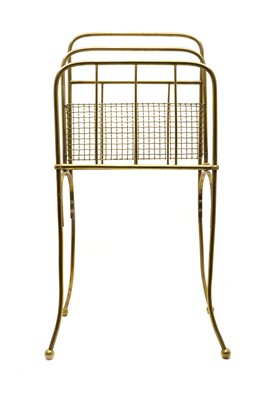Lot 485 - An Edwardian brass magazine stand