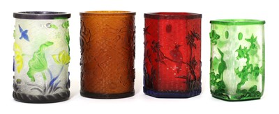 Lot 123 - A collection of four Chinese overlay Peking glass brush pots