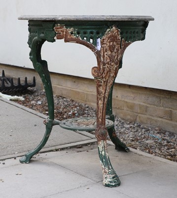 Lot 638 - A circular cast iron garden table