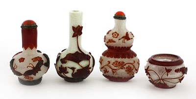 Lot 89 - Three small Chinese overlay Peking glass vases