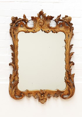 Lot 66 - A George III carved giltwood mirror