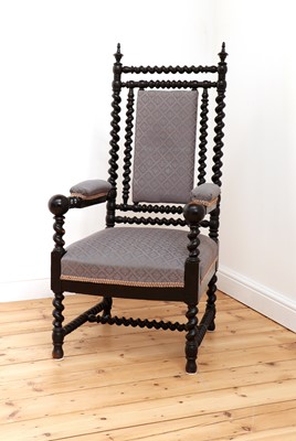 Lot 302 - A Victorian ebonised barley twist armchair