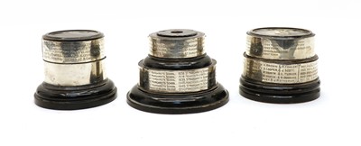 Lot 44 - Three ebonised trophy stands