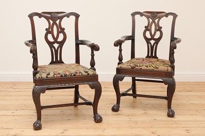 Lot 396 - A pair of Irish mahogany open armchairs