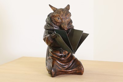 Lot 394 - A Swiss Black Forest carved lindenwood figure of a fox