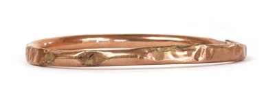 Lot 87 - A gold hollow bangle