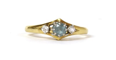 Lot 105 - An 18ct gold three stone aquamarine and diamond ring