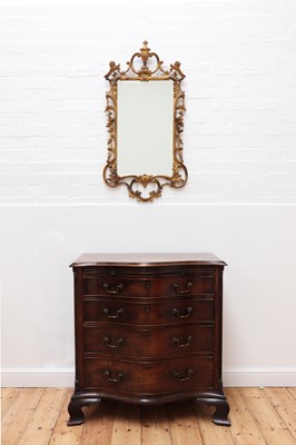 Lot 36 - A George III serpentine mahogany chest of drawers