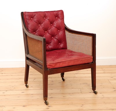 Lot 498 - A Regency-style mahogany caned bergère
