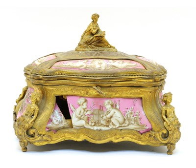 Lot 92 - A French porcelain and ormolu jewellery casket
