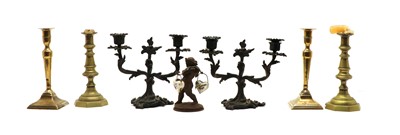 Lot 159 - Two pairs of brass candlesticks