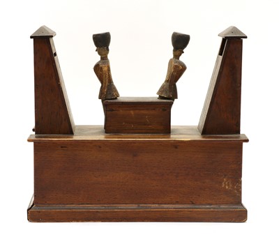 Lot 70 - A novelty softwood money box