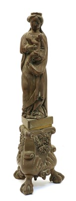Lot 101 - A bronze andiron