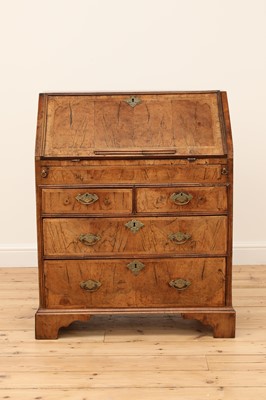 Lot 364A - A George II feather strung and crossbanded walnut bureau