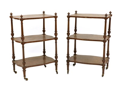 Lot 251 - A pair of Victorian walnut three tier étagère
