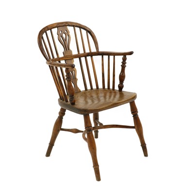 Lot 243 - A yew wood and elm low back Windsor chair