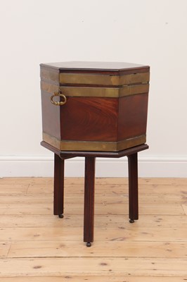 Lot 59 - A George III mahogany brass-bound wine cooler and stand
