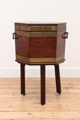 Lot 59 - A George III mahogany brass-bound wine cooler and stand