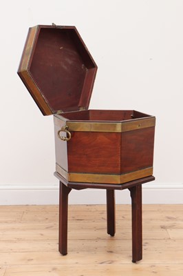 Lot 59 - A George III mahogany brass-bound wine cooler and stand