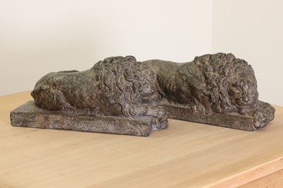 Lot 30 - A pair of cast lead lions after Antonio Canova