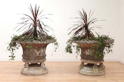 Lot 95 - A pair of large composite stone garden planters