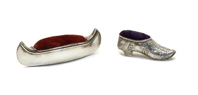 Lot 14 - A novelty silver pin cushion in the form of a canoe
