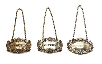 Lot 26 - A pair of George IV silver spirit labels