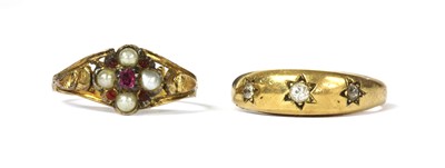 Lot 9 - A gold three stone diamond ring