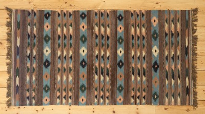 Lot 260 - A Persian kilim flatweave rug