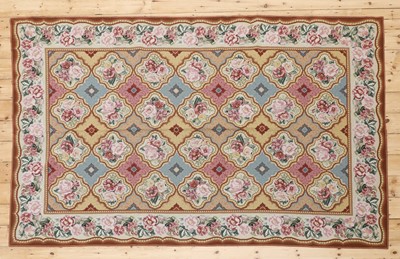 Lot 392 - A needlepoint rug