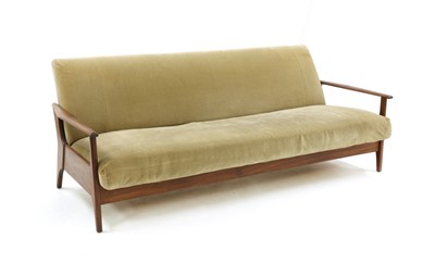 Lot 307 - A teak 'Sunresta' sofa/daybed