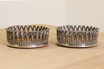 Lot 347 - A pair of William lV silver decanter coasters