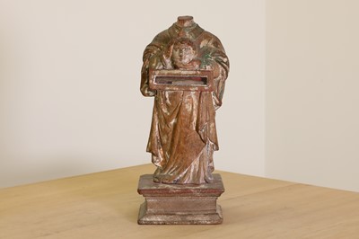 Lot 395 - A carved wood reliquary figure of St Denis the Martyr