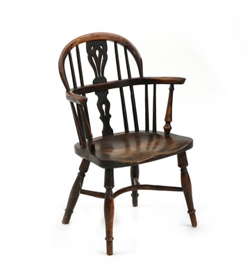 Lot 564 - An elm and yew child's Windsor chair