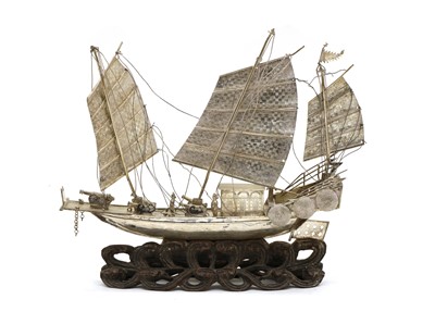 Lot 3 - A Chinese export white metal model of a junk
