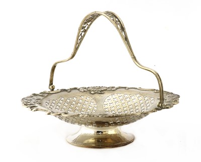 Lot 150 - A Chinese export silver swing-handled fruit basket